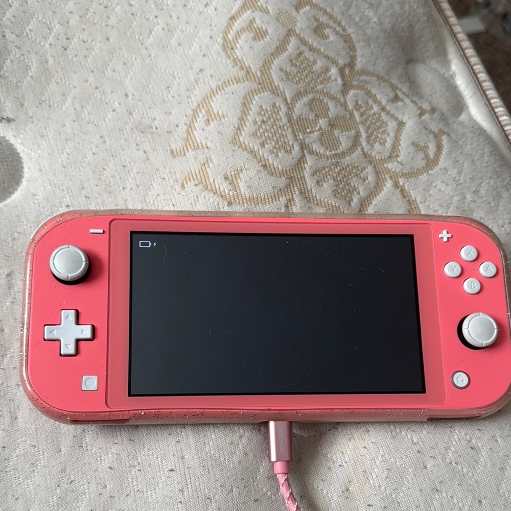 Nintendo Pink Handheld Console with Vibrant Screen